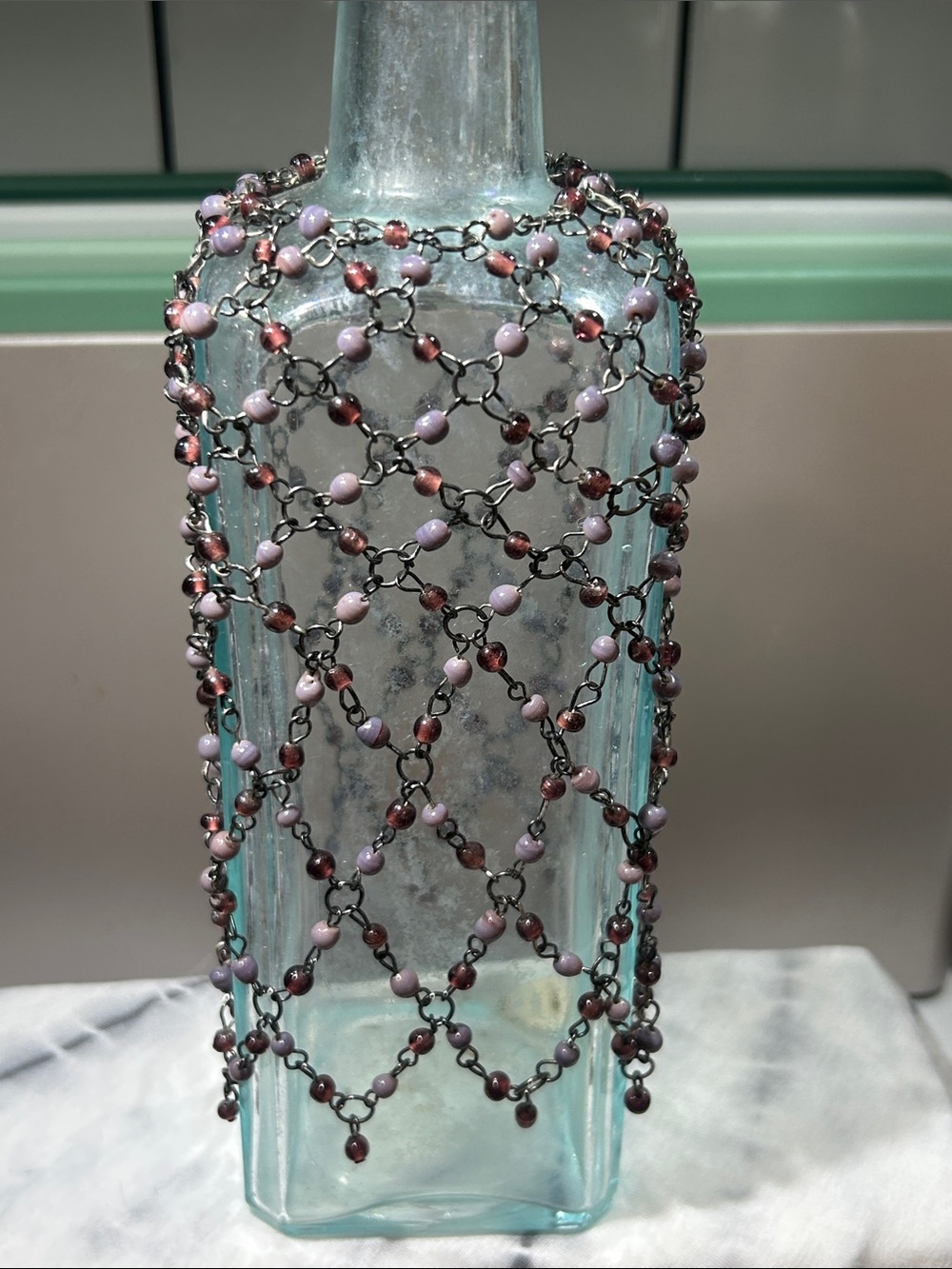 Vintage purple and maroon beaded bottle cover